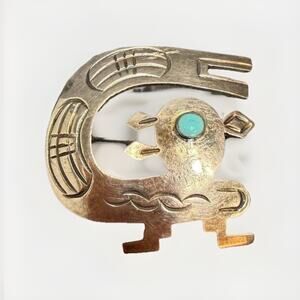 Vintage Peruvian sterling silver pendant featuring a detailed Andean / Pre-Colum